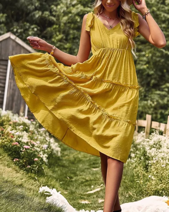 Tiered V neck dress with ties