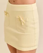 Denim Mini Skort With Front Pocket And Bow Trim