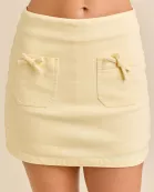 Denim Mini Skort With Front Pocket And Bow Trim
