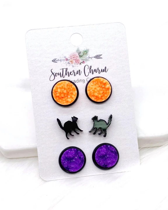 12mm Bright Orange Crystals/Scaredy Cats/Purple Ice in Black Settings