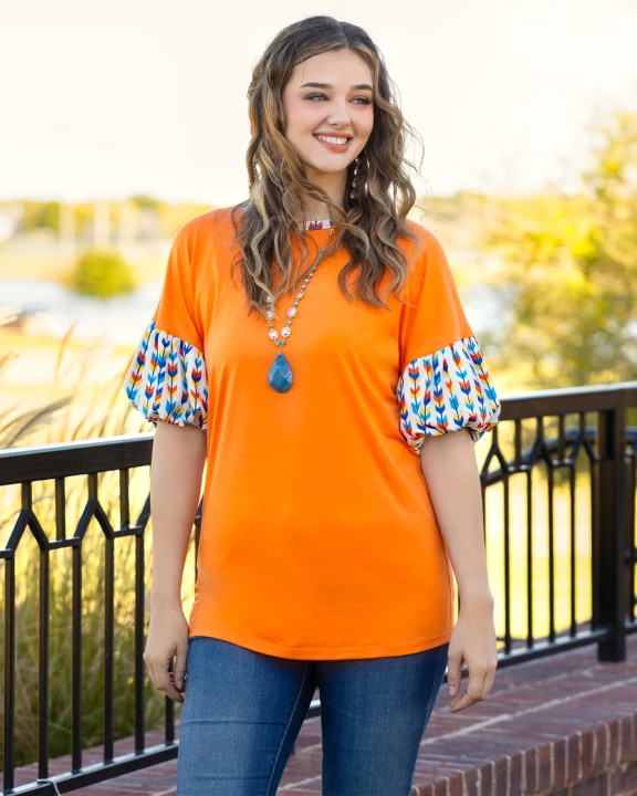 30012 - Orange Top with Geometric Balloon Sleeves